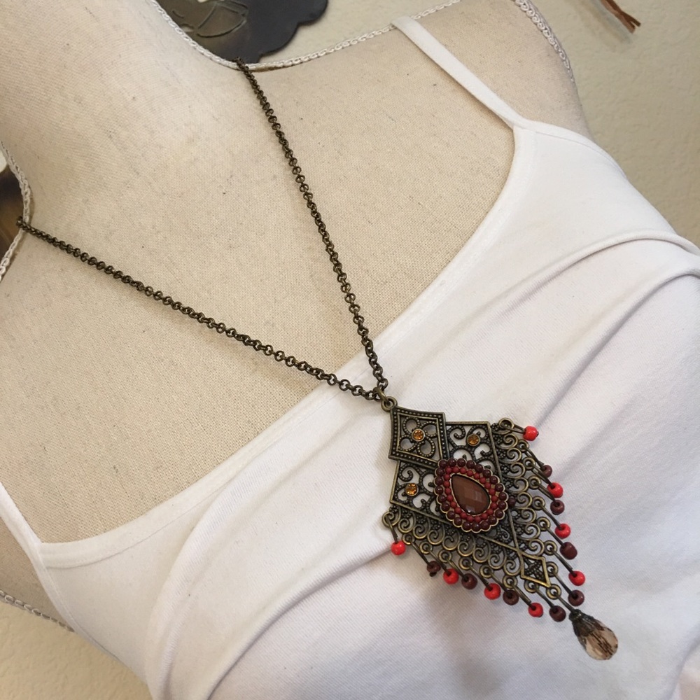 Aged brass tone dangle bead medallion necklace